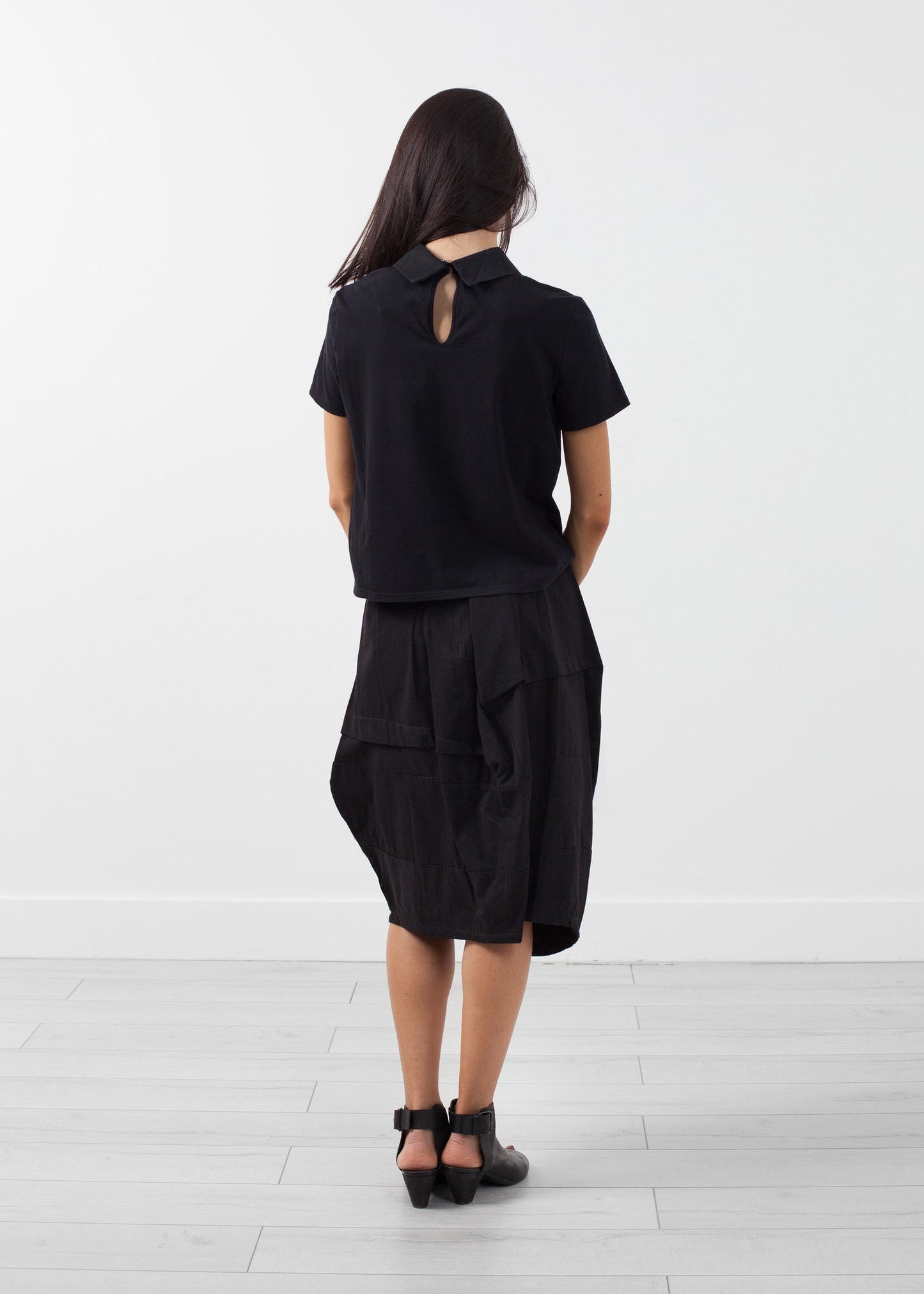 Blusa a doppio collo